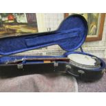 A Remo cased banjo