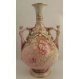 A Royal Worcester vase, decorated in turquoise, purple and pink with flowers, having figural
