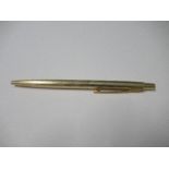 A gold plated Parker ball point pen