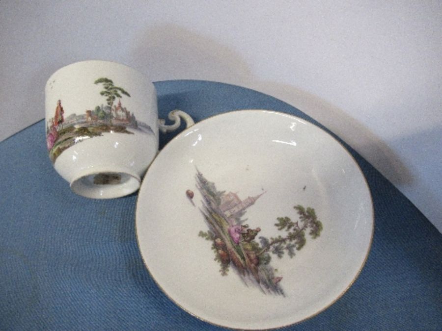 An 18th century coffee can and saucer, decorated in colours with figures in a landscape, together - Image 7 of 9