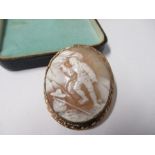 A shell cameo brooch, the mount stamped '9ct', 5cm long
