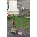 A brass and copper telescopic lamp standard, decorated with flowers and scrolls, together with