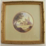 A Royal Worcester circular porcelain plaque or plate centre, ruined buildings in landscape by George