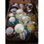 A collection of 19th century and 20th century cups and saucers, mainly Worcester - all the cups