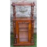 A Victorian walnut cabinet, with shelf having pierced gallery to three sides, raised on turned