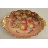 A Royal Worcester oval dish, decorated with hand painted fruit by Freeman, diameter 12ins - Good