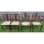 A pair of reproduction mahogany open arm dining chairs, together with a pair of mahogany dining