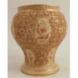 A Royal Worcester blush ivory pierced baluster vase, decorated with flowers, dated 1888, height 7ins