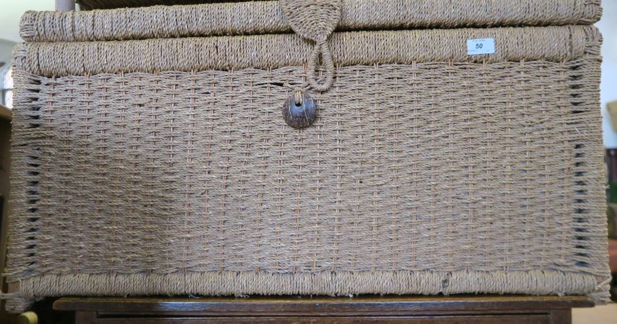 Two fishing creel baskets and a laundry basket