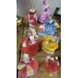 Eight Royal Doulton figures, Janet, Fair Maiden, Autumn Breeze, Coralie, Elyse, Babie, Lady Pamela