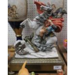 A Capodimonte porcelain figure, of Napoleon on horseback, on gilt metal base, height 14ins