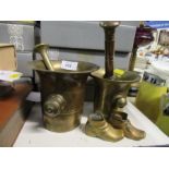 Two brass pestle and mortars, together with a pair of brass model shoes