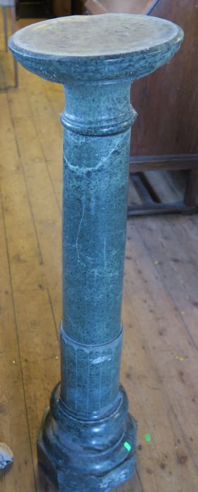 A green marble column, height 43ins