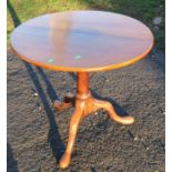 An Antique mahogany circular table, with bird cage action, on a tripod base, diameter 28ins,