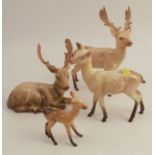 Four Beswick models, of stags, doe and faun