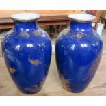 A pair of Crescent china vases, decorated with gilt fish to a blue ground, af, height 13ins