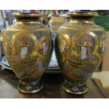 A pair of 20th century Oriental vases with character marks to the base, height 12ins