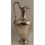 A Victorian silver ewer, with engraved decoration, London 1853, maker Edward and John Barnard,