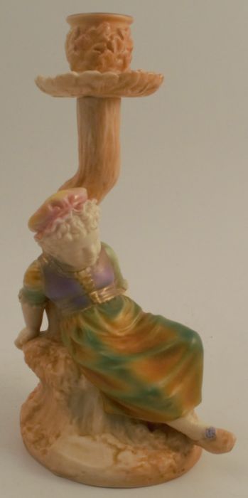 A Hadleys Worcester blush ivory and shot silk candle stick, formed as a child seated by a tree, - Image 2 of 4