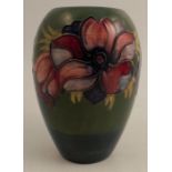 A Moorcroft pottery vase, decorated in the anemone pattern, height 7.5ins