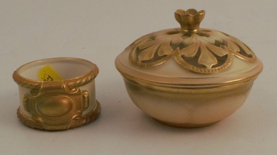 A Royal Worcester gilded ivory covered bowl, the pierced cover decorated with a flower finial and