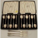 Two cased sets of six hallmarked silver tea spoons, together with three hallmarked silver three