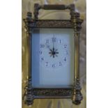 A brass cased carriage clock, height including handle 5ins