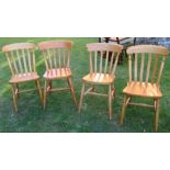 A set of four kitchen chairs