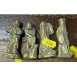 Four Oriental brass figures, height 3ins