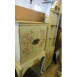 A painted floor standing corner cupboard, decorated with flowers, together with a drinks cabinet,