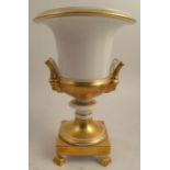 A Vista Alegre Portugal porcelain urn, in white and gold, height 11.5ins, together with a white urn,