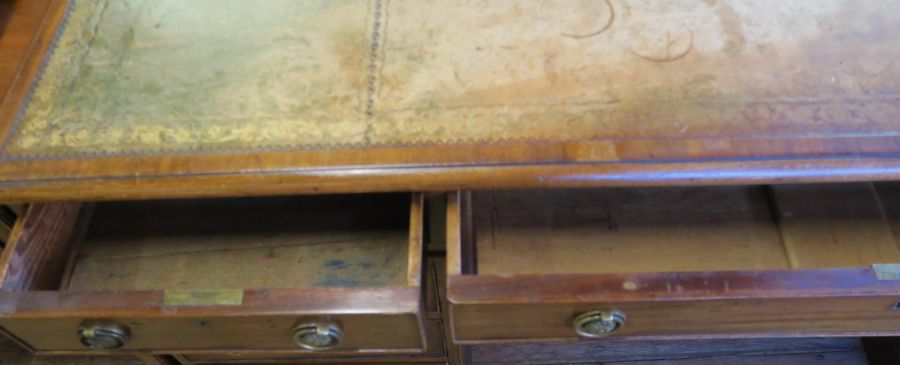 A reproduction mahogany partners desk, fitted with one long frieze drawer flanked by two further - Image 2 of 3