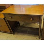 A 19th century mahogany side table, fitted with a long deep drawer, raised on square legs, united by