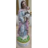 A 19th century Staffordshire figure of Madonna and child, height 13.5ins