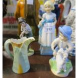 Two Royal Worcester figures, a jug and another figure of a boy playing cricket