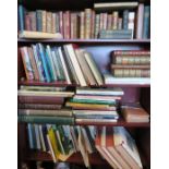 Four shelves of books, to include leather bound books