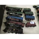Four Hornby trains and tenders and another train