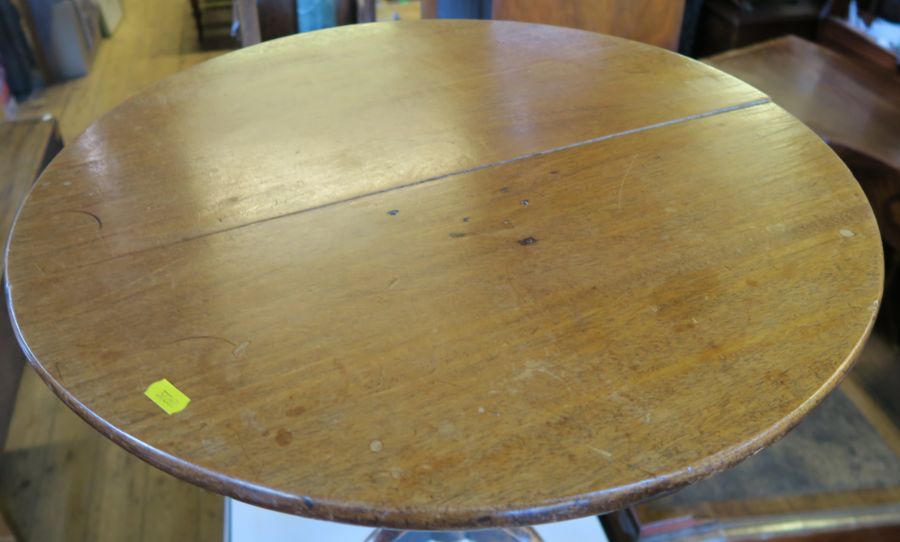 An Antique mahogany topped table, on an elm tripod base, diameter 23ins, height 23ins - Image 2 of 2