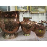 A collection of copper ware, to include a warming pan, sauce pans, coal scuttles etc