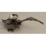 A silver plated stand, with pierced bowl, raised on a stand formed as leaves, length 9.5ins