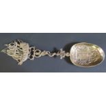 A Large Continental Silver Decorative Spoon, the bowl decorated with an armorial bearing three