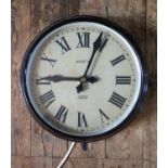 A MAGNETA Bakelite Cased Mains Powered Electric Wall Clock, 11" dial, running