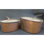 A Pair of 19th Century Oval Copper Saucepans with covers, largest 38cm diam.