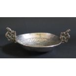 An Antique Continental White Metal Lemon Strainer, 13cm diam. to handles, 85g