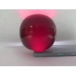 A Large Faux Cherry Amber Ball, c. 63mm diam., 176.4g