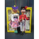 A Pelham Puppet SS7 Mitzi and SS Fritzi in Boxes, one with Instructions