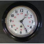 A British Railways Western Region Wall Clock, 23.5cm diam. back plate