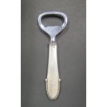 A Georg Jensen Silver Reeded Bottle Opener, 11.3cm