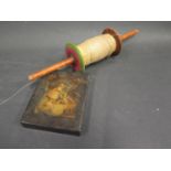 A Vintage Kite Winder and papier mache box