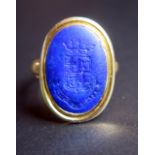 A Georgian Period Lapis Lazuli Seal Ring in an unmarked gold setting, helix 18x13mm, size G, 5.8g